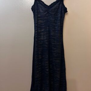 Sheer Black Slip Dress with Delicate Lace Trim and Tiger Print Lining